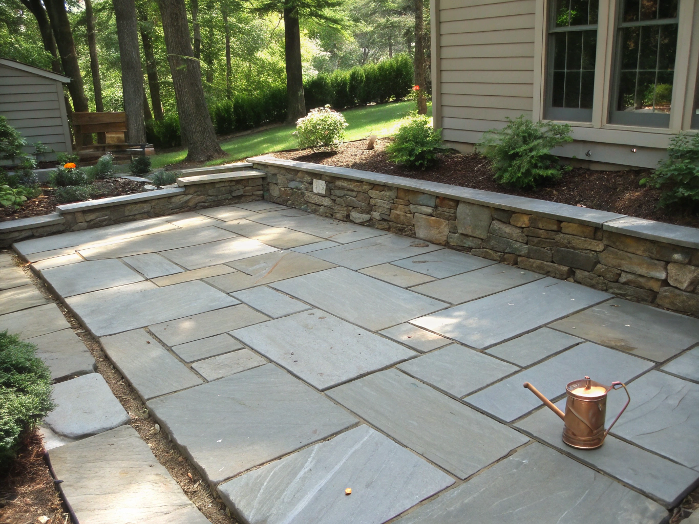 Modern backyard retreat with limestone patio